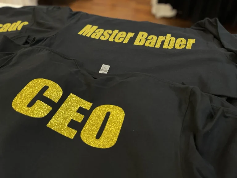 Black shirts with gold glitter CEO and Master Barber lettering
