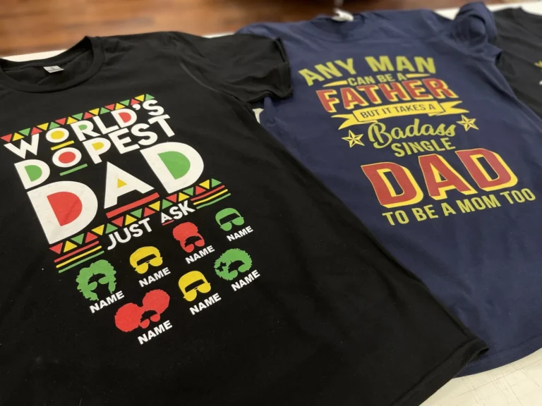 Black and navy shirts with colorful dad themed designs