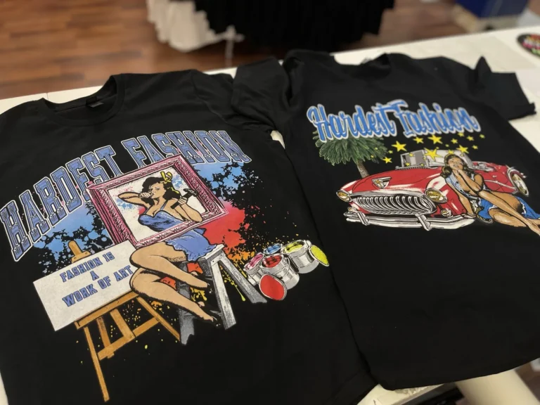 Two black shirts with illustrated fashion and classic car designs